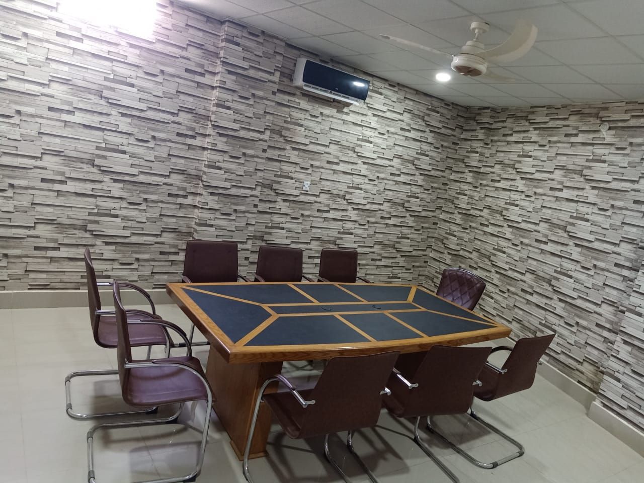 Air-conditioned conference room with a meeting table at the Kandh Kot branch