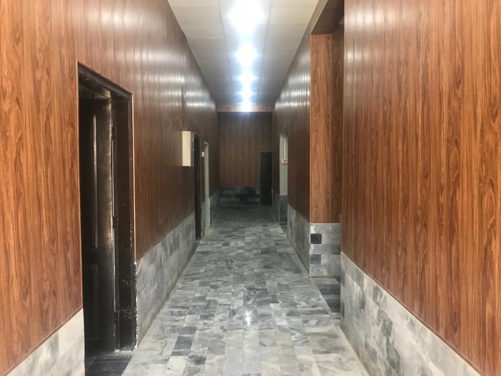 Timber-panelled corridor at the Shikarpur branch